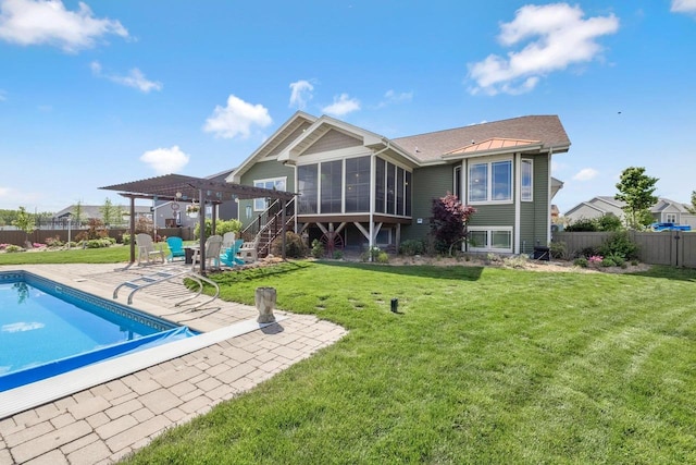 335 Bella Way, Sun Prairie, WI 53590 - back of house featuring a sunroom, a pergola, a patio area, and stairway