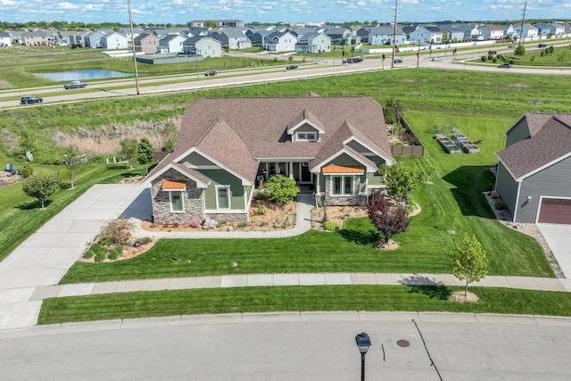 335 Bella Way, Sun Prairie, WI 53590 - aerial perspective of suburban area featuring a nearby body of water