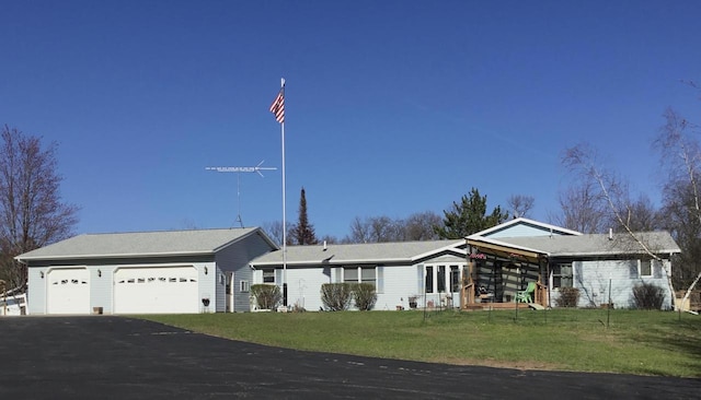 N9960 Meadowlark Ln, Crivitz, WI 54114 - single story home with asphalt driveway and a front lawn