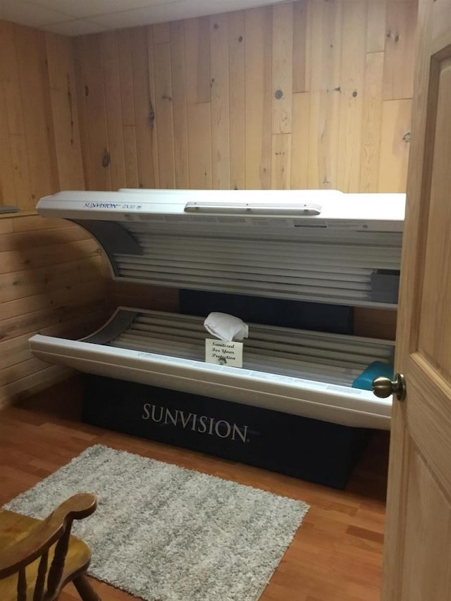 N9960 Meadowlark Ln, Crivitz, WI 54114 - detailed view of wooden walls, a tanning bed, and wood finished floors
