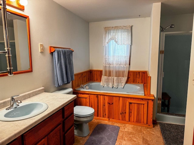 N9960 Meadowlark Ln, Crivitz, WI 54114 - full bathroom featuring a garden tub, a shower stall, vanity, toilet, and a wainscoted wall