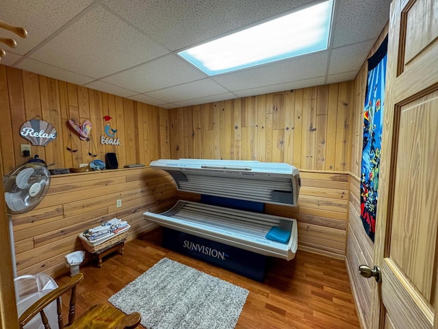 N9960 Meadowlark Ln, Crivitz, WI 54114 - misc room featuring a paneled ceiling, wooden walls, and wood finished floors