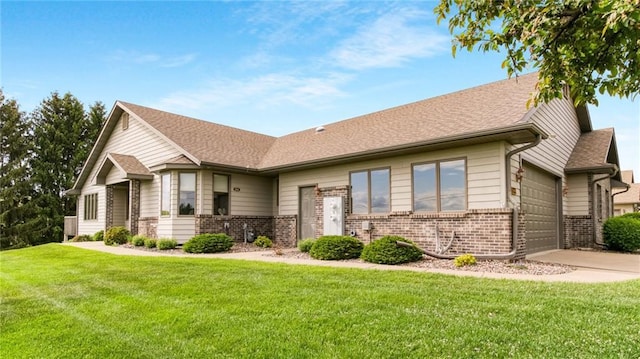 2504 E Princeton Ave, Eau Claire, WI 54703 - view of front of house featuring brick siding, a garage, concrete driveway, a front lawn, and a shingled roof