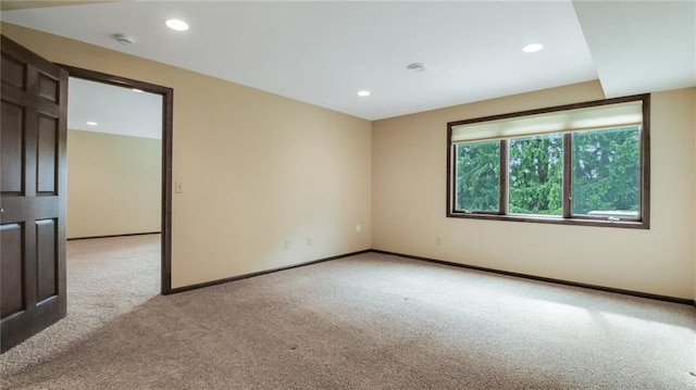 2504 E Princeton Ave, Eau Claire, WI 54703 - empty room featuring light carpet, baseboards, and recessed lighting