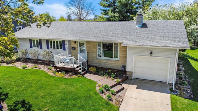 308 Maple Dr, Mount Horeb, WI 53572 - view of front of home featuring stone siding, a shingled roof, a front yard, and driveway