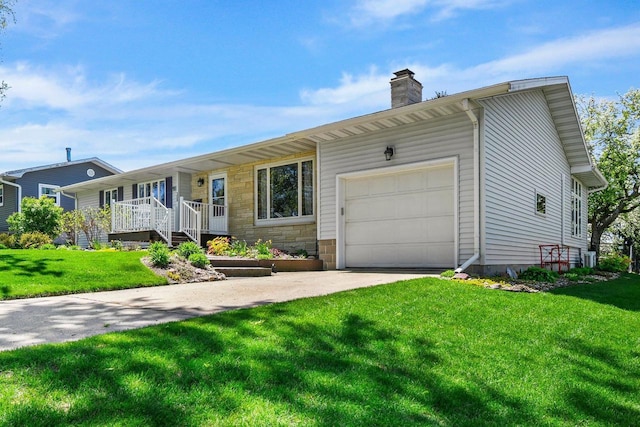 308 Maple Dr, Mount Horeb, WI 53572 - single story home featuring a chimney, a front yard, a garage, and concrete driveway