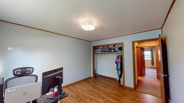 602 W Carol St, Colby, WI 54421 - bedroom with wood finished floors, baseboards, and a closet