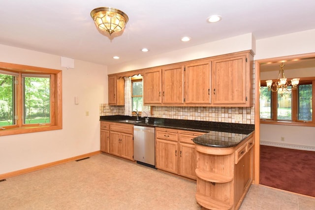 15060 Carpenter Rd, Brookfield, WI 53005 - kitchen featuring dishwasher, baseboard heating, dark countertops, healthy amount of natural light, and recessed lighting