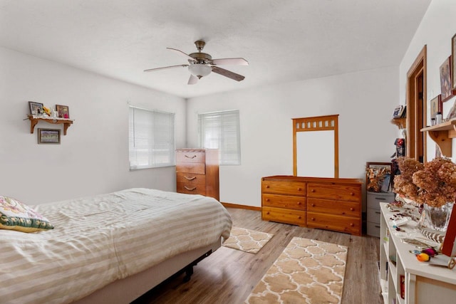 2020 Autumn Ln, Kaukauna, WI 54130 - bedroom featuring light wood-style floors, baseboards, and ceiling fan