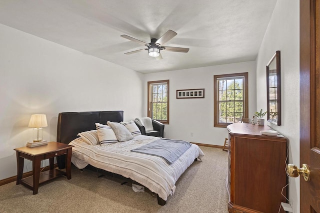 918 E Kramer Ln, Appleton, WI 54915 - bedroom featuring baseboards, light carpet, and a ceiling fan