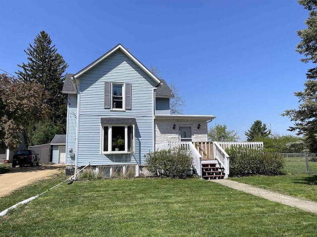 108 S Center St, Orfordville, WI 53576 - traditional home with a deck
