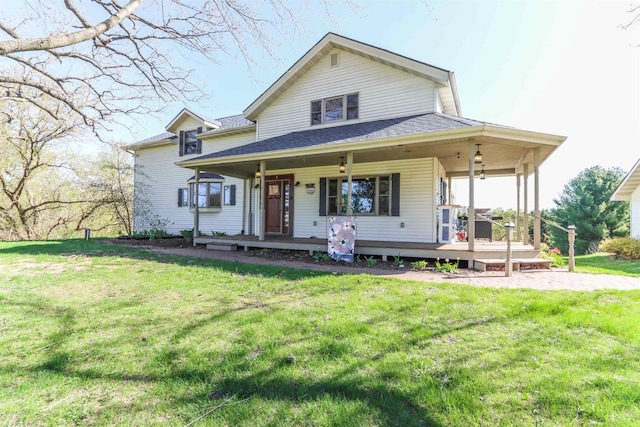 N4618 State Road 49, Waupaca, WI 54981 - farmhouse inspired home featuring covered porch, a front lawn, and roof with shingles