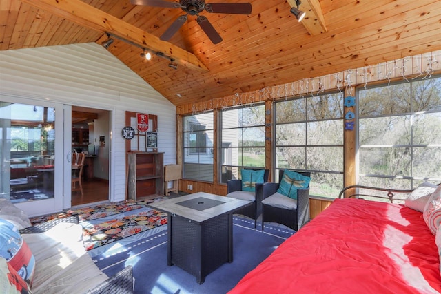 N4618 State Road 49, Waupaca, WI 54981 - sunroom with rail lighting, vaulted ceiling, a ceiling fan, and outdoor lounge area