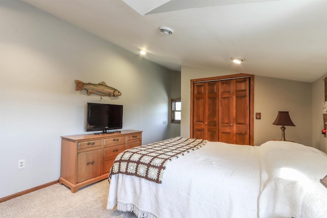 N4618 State Road 49, Waupaca, WI 54981 - bedroom featuring lofted ceiling, light carpet, a closet, and baseboards
