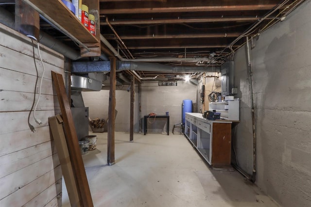 N4618 State Road 49, Waupaca, WI 54981 - unfinished basement featuring a water pressure tank and electric panel