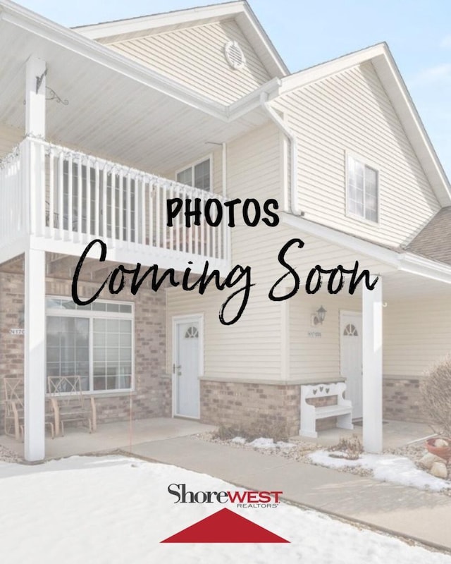 W197N17096 Stonewall Dr Unit 4, Jackson, WI 53037 - property entrance featuring brick siding