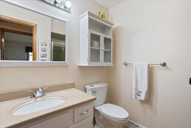 1408 S Hemlock Ave, Marshfield, WI 54449 - bathroom featuring toilet and vanity