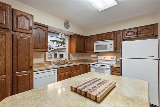 1408 S Hemlock Ave, Marshfield, WI 54449 - kitchen with white appliances, a sink, and light countertops