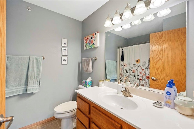 1119 Enterprise Dr, Verona, WI 53593 - full bath featuring toilet, tile patterned flooring, vanity, curtained shower, and baseboards