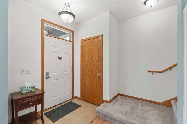 1119 Enterprise Dr, Verona, WI 53593 - entrance foyer featuring baseboards and light tile patterned floors
