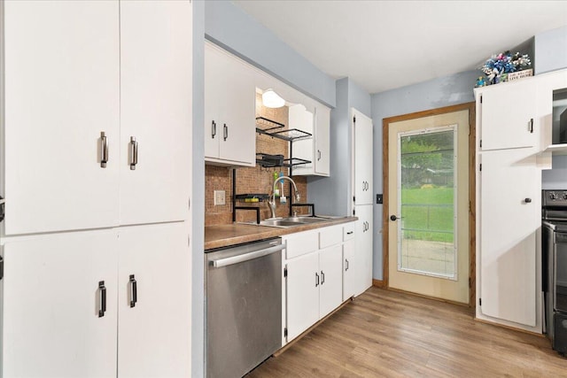 1528 Jefferson St, West Bend, WI 53090 - kitchen with dishwasher, a sink, decorative backsplash, and white cabinets