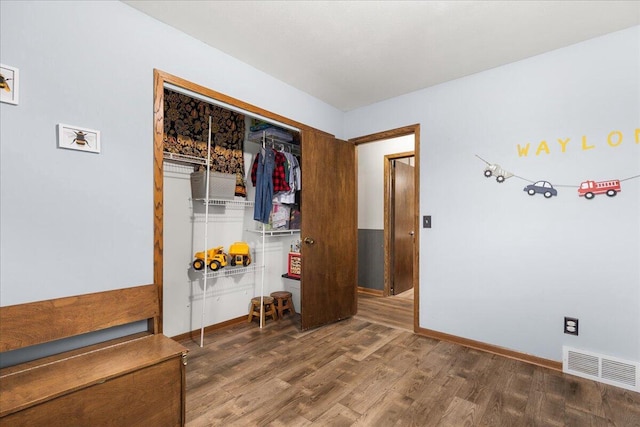 1528 Jefferson St, West Bend, WI 53090 - interior space featuring wood finished floors and baseboards