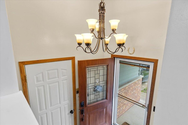 1528 Jefferson St, West Bend, WI 53090 - foyer with a chandelier