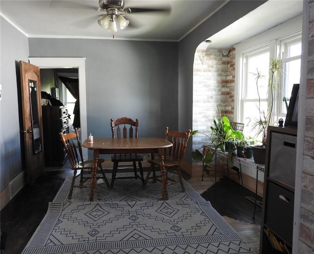 818 W Main St, Augusta, WI 54722 - dining space with wood finished floors, a ceiling fan, crown molding, and baseboards