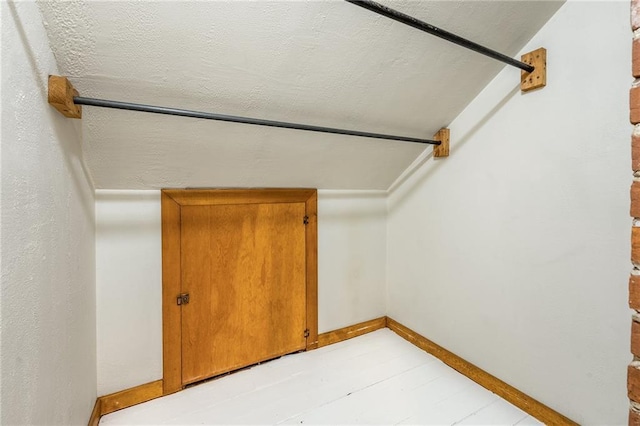 stairway with baseboards