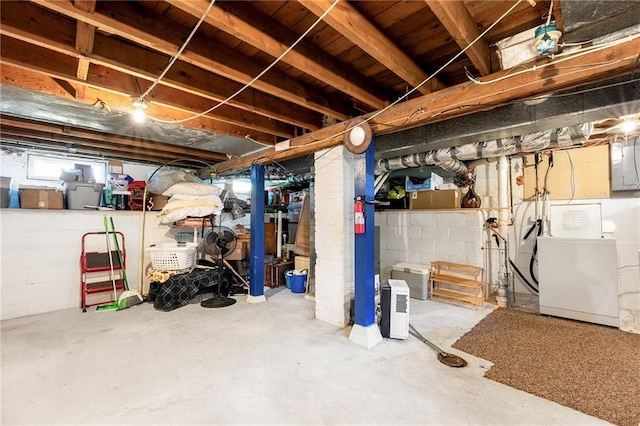 basement featuring separate washer and dryer