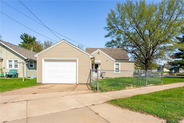 view of front facade featuring a gate, a garage, and concrete driveway