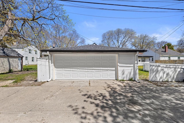 detached garage with fence