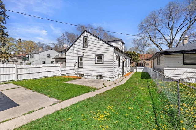 back of property featuring a patio area