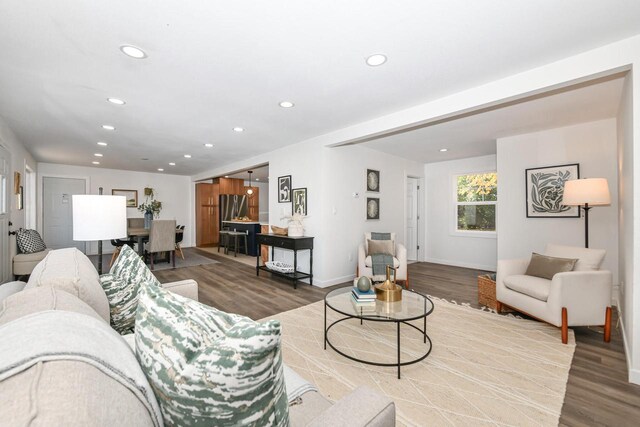 7113 N Navajo Ave, Glendale, WI 53217 - living area featuring recessed lighting, wood finished floors, and baseboards