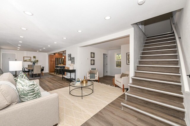 7113 N Navajo Ave, Glendale, WI 53217 - living area featuring recessed lighting, wood finished floors, and stairs