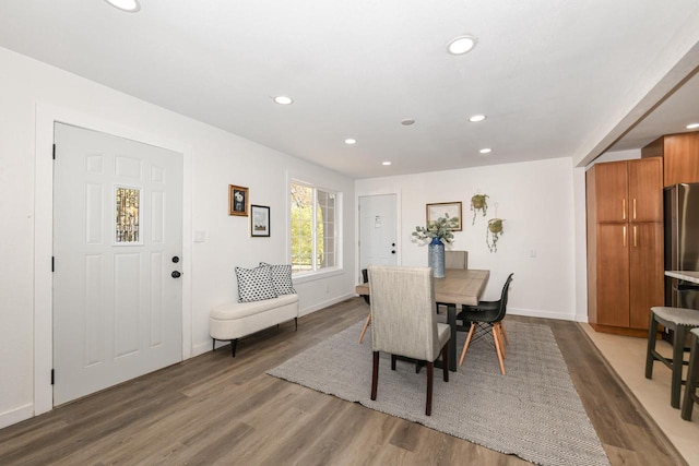 7113 N Navajo Ave, Glendale, WI 53217 - dining area featuring wood finished floors, recessed lighting, and baseboards