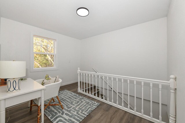 7113 N Navajo Ave, Glendale, WI 53217 - bedroom with wood finished floors, baseboards, an office area, and a crib