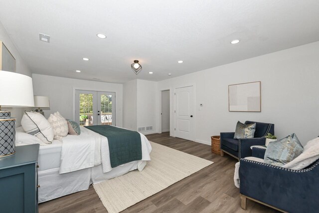 7113 N Navajo Ave, Glendale, WI 53217 - bedroom featuring access to exterior, french doors, wood finished floors, recessed lighting, and baseboards