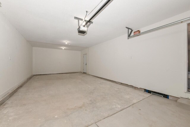 7113 N Navajo Ave, Glendale, WI 53217 - garage featuring a garage door opener