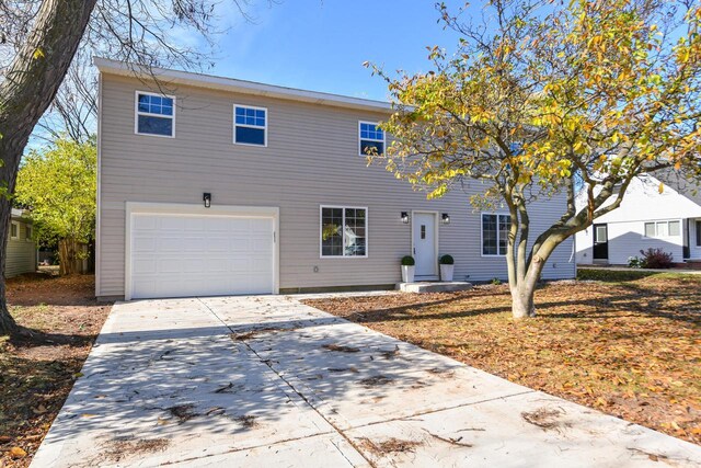 7113 N Navajo Ave, Glendale, WI 53217 - view of front of home featuring an attached garage and concrete driveway