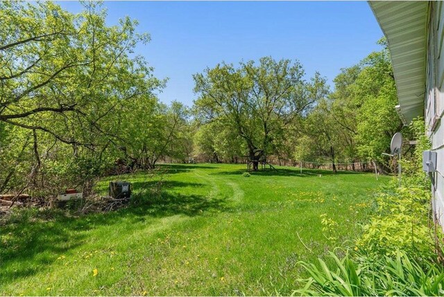1361 60th St Unit D, Turtle Lake, WI 54889 - view of green lawn