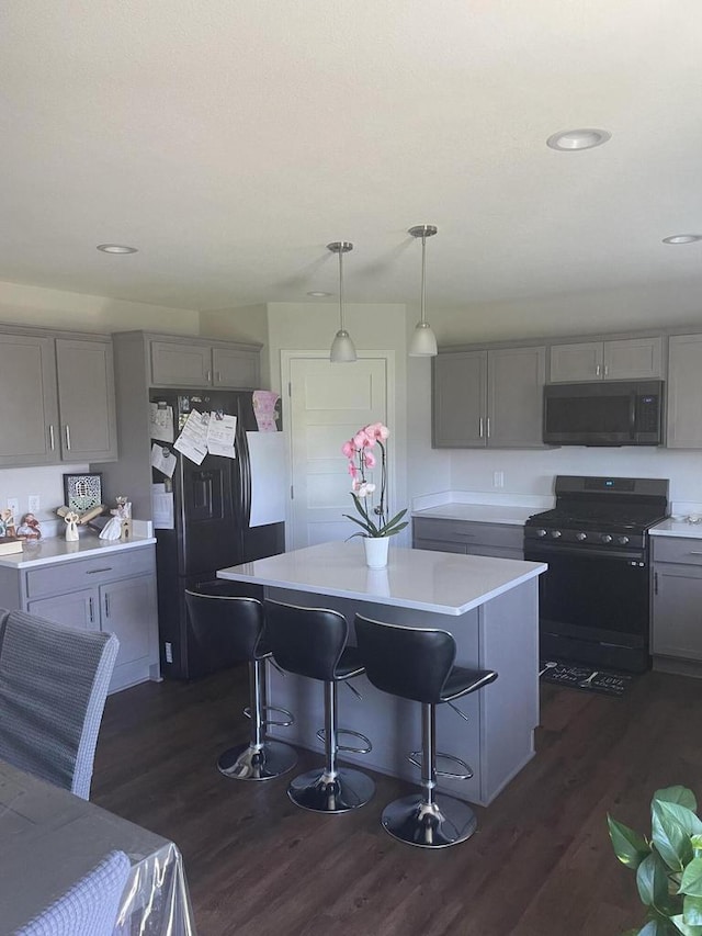 425 Champlain Dr, Johnson Creek, WI 53038 - kitchen with black appliances, gray cabinets, dark wood-style flooring, and recessed lighting