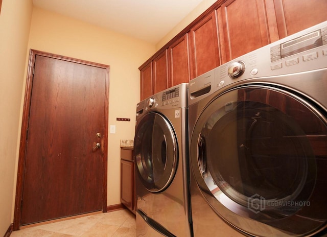 1839 Trevino Trl Unit 6, Mount Pleasant, WI 53405 - clothes washing area featuring washing machine and dryer, cabinet space, and baseboards