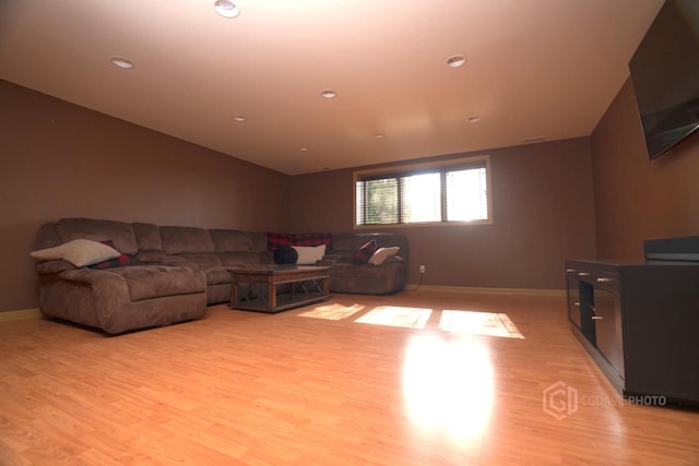 1839 Trevino Trl Unit 6, Mount Pleasant, WI 53405 - living area featuring light wood-style flooring, baseboards, lofted ceiling, and recessed lighting