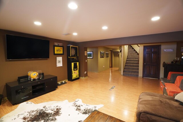 1839 Trevino Trl Unit 6, Mount Pleasant, WI 53405 - living area featuring stairway, wood finished floors, recessed lighting, and baseboards
