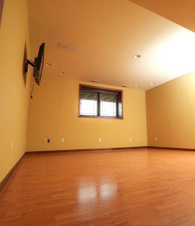 1839 Trevino Trl Unit 6, Mount Pleasant, WI 53405 - spare room featuring light wood-type flooring, recessed lighting, and baseboards