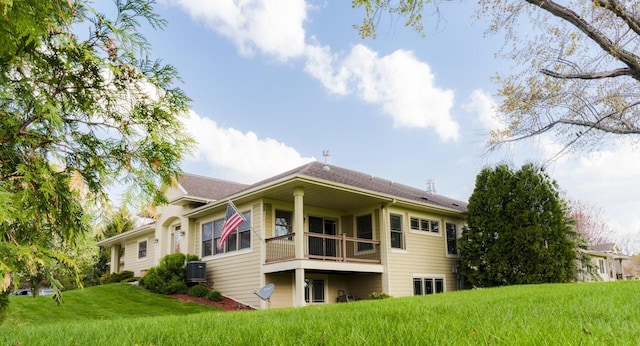 1839 Trevino Trl Unit 6, Mount Pleasant, WI 53405 - back of property with cooling unit and a lawn