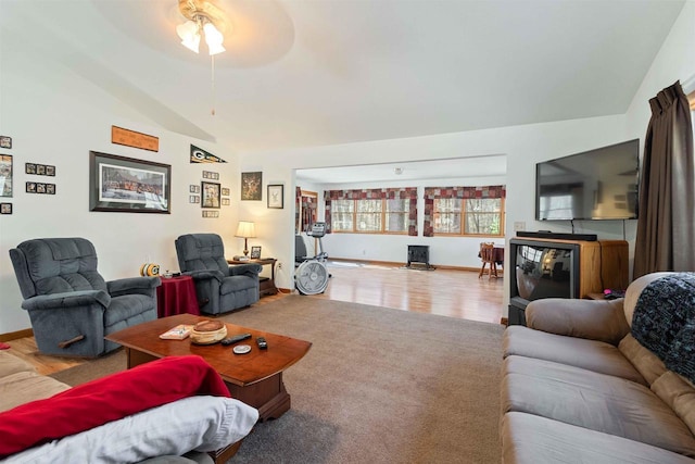1809 S Badger Ct, Arkdale, WI 54613 - living area with vaulted ceiling, a ceiling fan, wood finished floors, and baseboards