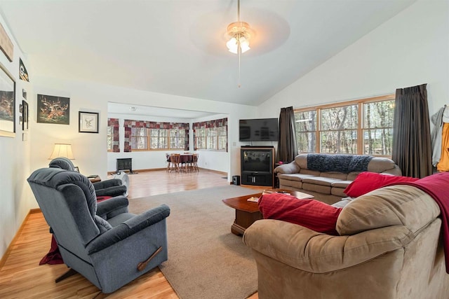 1809 S Badger Ct, Arkdale, WI 54613 - living area featuring a ceiling fan, plenty of natural light, light wood finished floors, and high vaulted ceiling