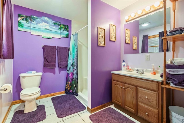 1809 S Badger Ct, Arkdale, WI 54613 - bathroom featuring a stall shower, tile patterned flooring, vanity, and toilet